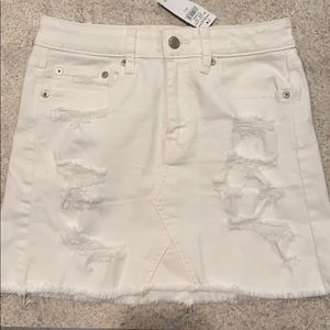 A white ripped American Eagle skirt